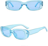 Two pairs of blue sunglasses on a white background