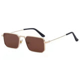 Sunglasses with gold frame and brown lenses on a white background
